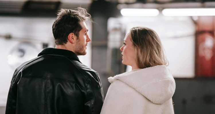 Modern Sugar Baby and Sugar Daddy having an honest conversation in a subway setting, reflecting trust and open communication in Sugar dating 2025.
